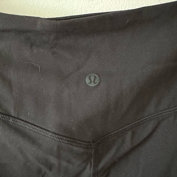 Lululemon black nulu and crisscross mesh stirrup tight leggings size 6 - Picture 8 of 10